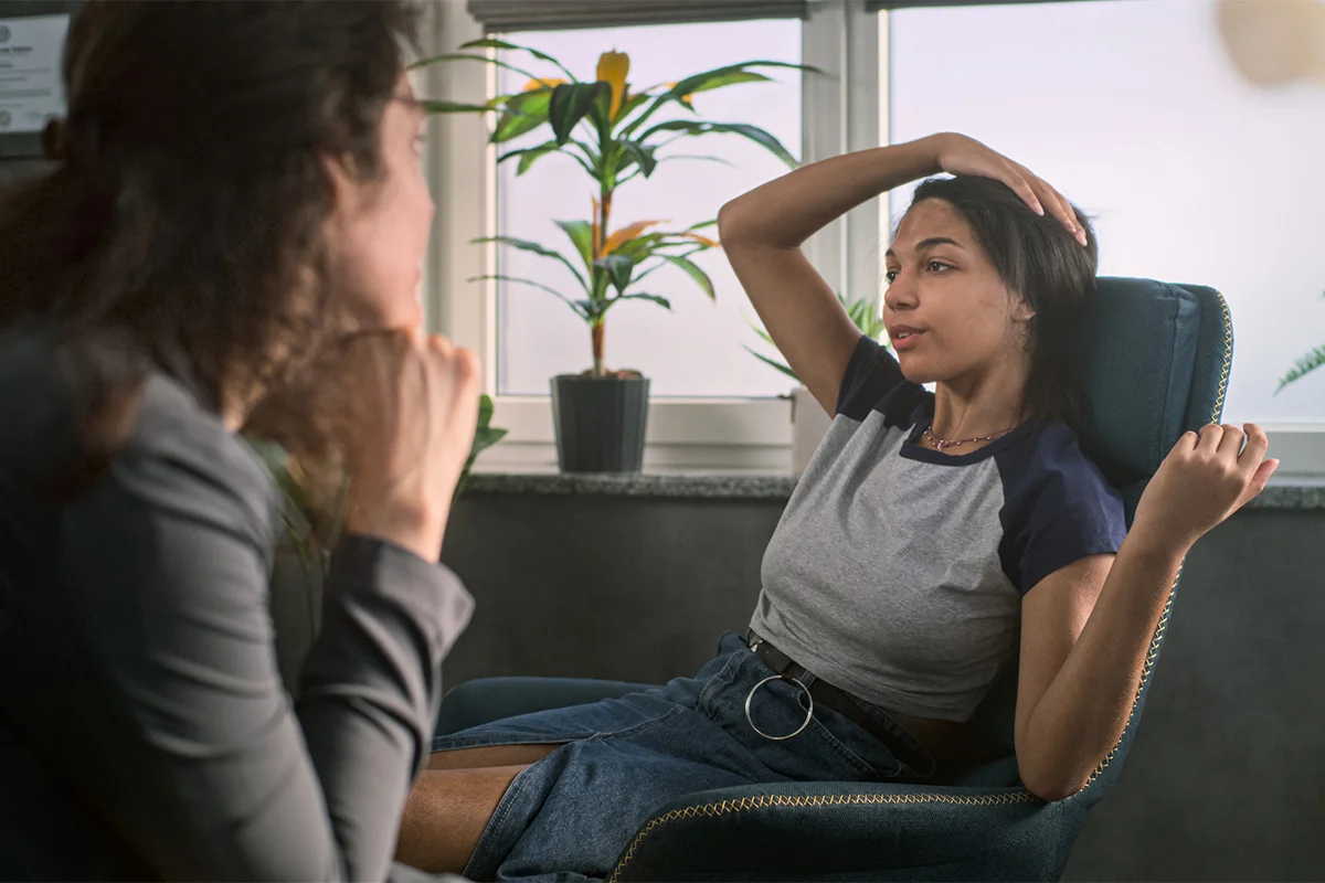 A client and a therapist at an alcohol detox center