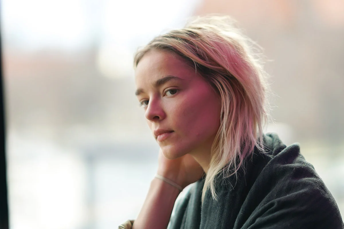Woman experiencing stress and relapse