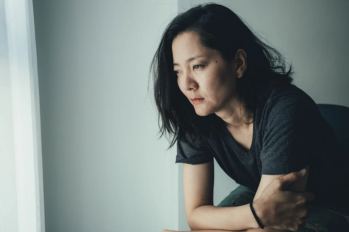Woman experiencing marijuana withdrawal symptoms