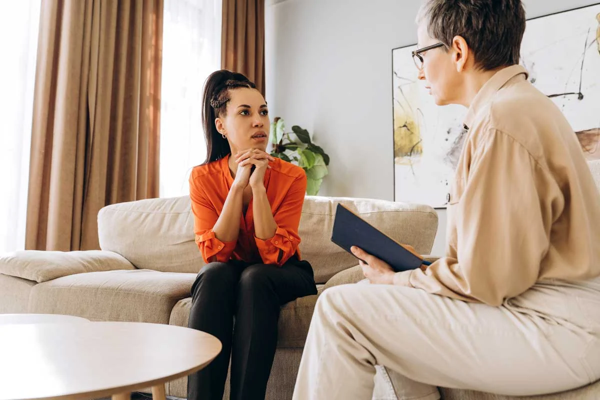 Two people discussing alcohol rehab in Santa Rosa County