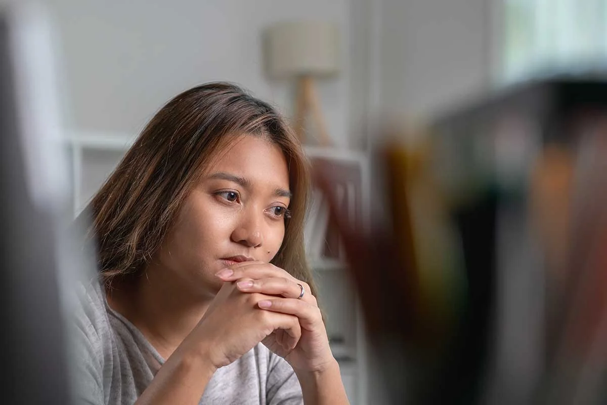 Woman thinking about substance use disorder common obstacles