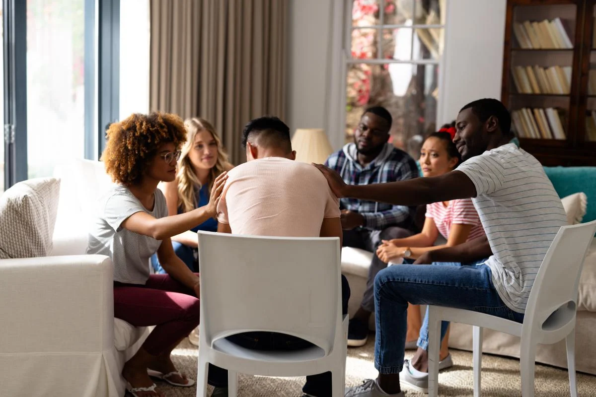 People sitting in a circle at a partial hospitalization program in Gulf Breeze