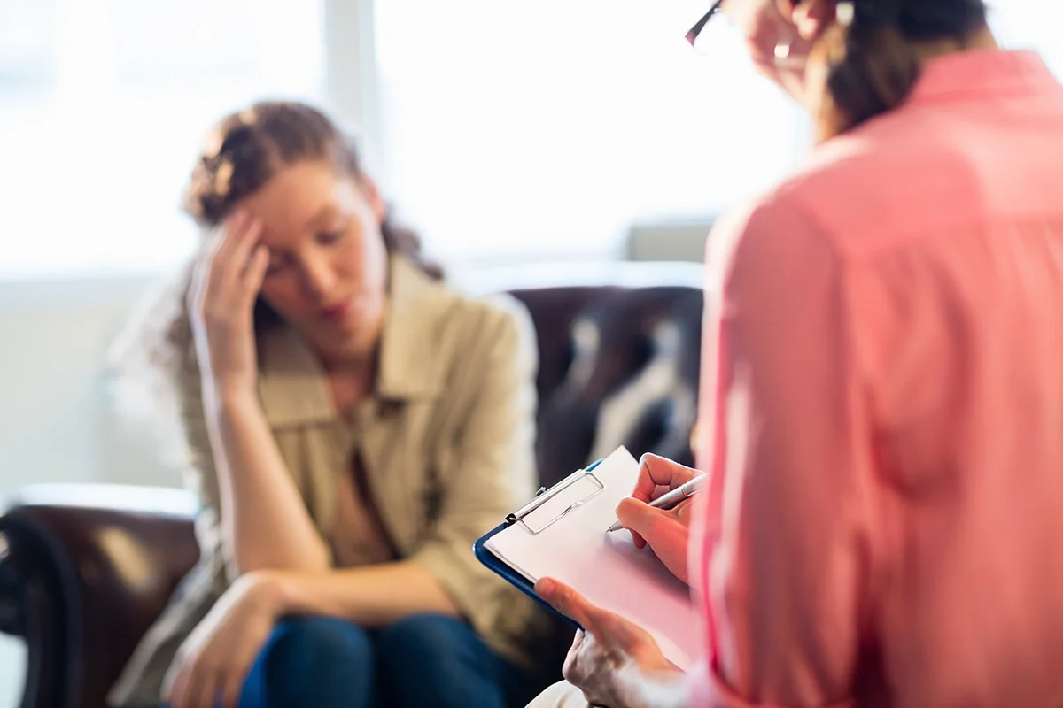Person in counseling for addiction asking therapist why is heroin addictive