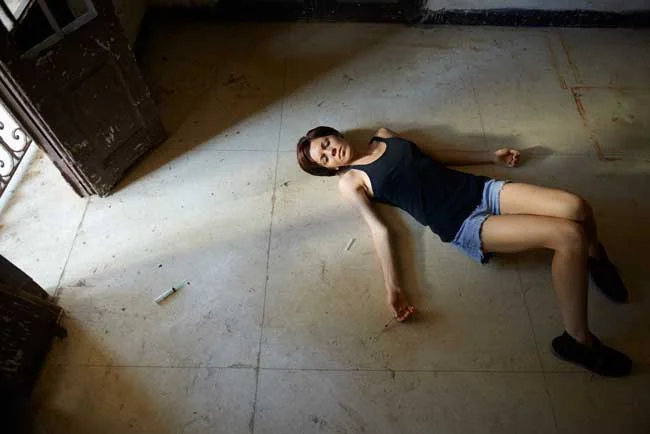 image of woman overdosed from synthetic opioid fentanyl for article New Government Data Points to Sharp Increase in Overdose Deaths