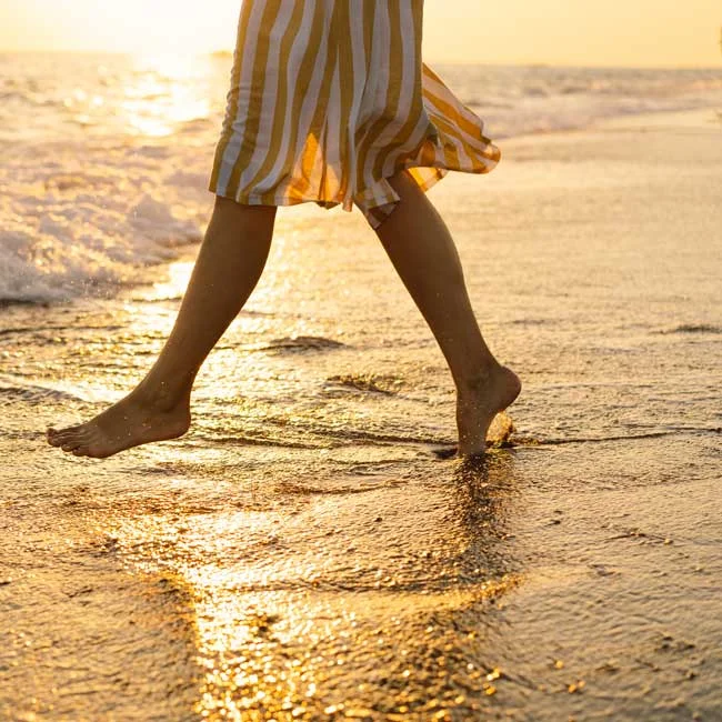 graduate Greg interview feature image|man in recovery|walking on beach